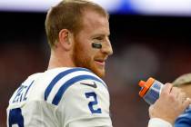 Indianapolis Colts quarterback Carson Wentz (2) waits for play to resume during an NFL football ...