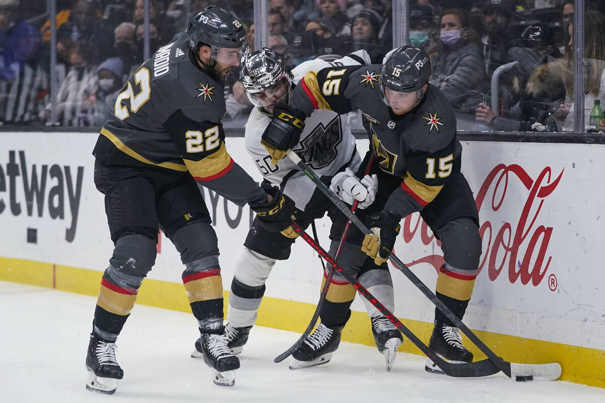 Los Angeles Kings defenseman Sean Durzi (50) defends against Vegas Golden Knights center Jake L ...