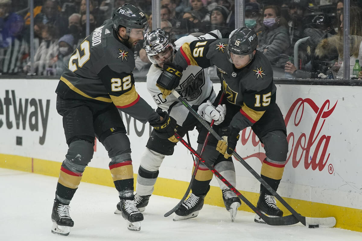 Los Angeles Kings defenseman Sean Durzi (50) defends against Vegas Golden Knights center Jake L ...