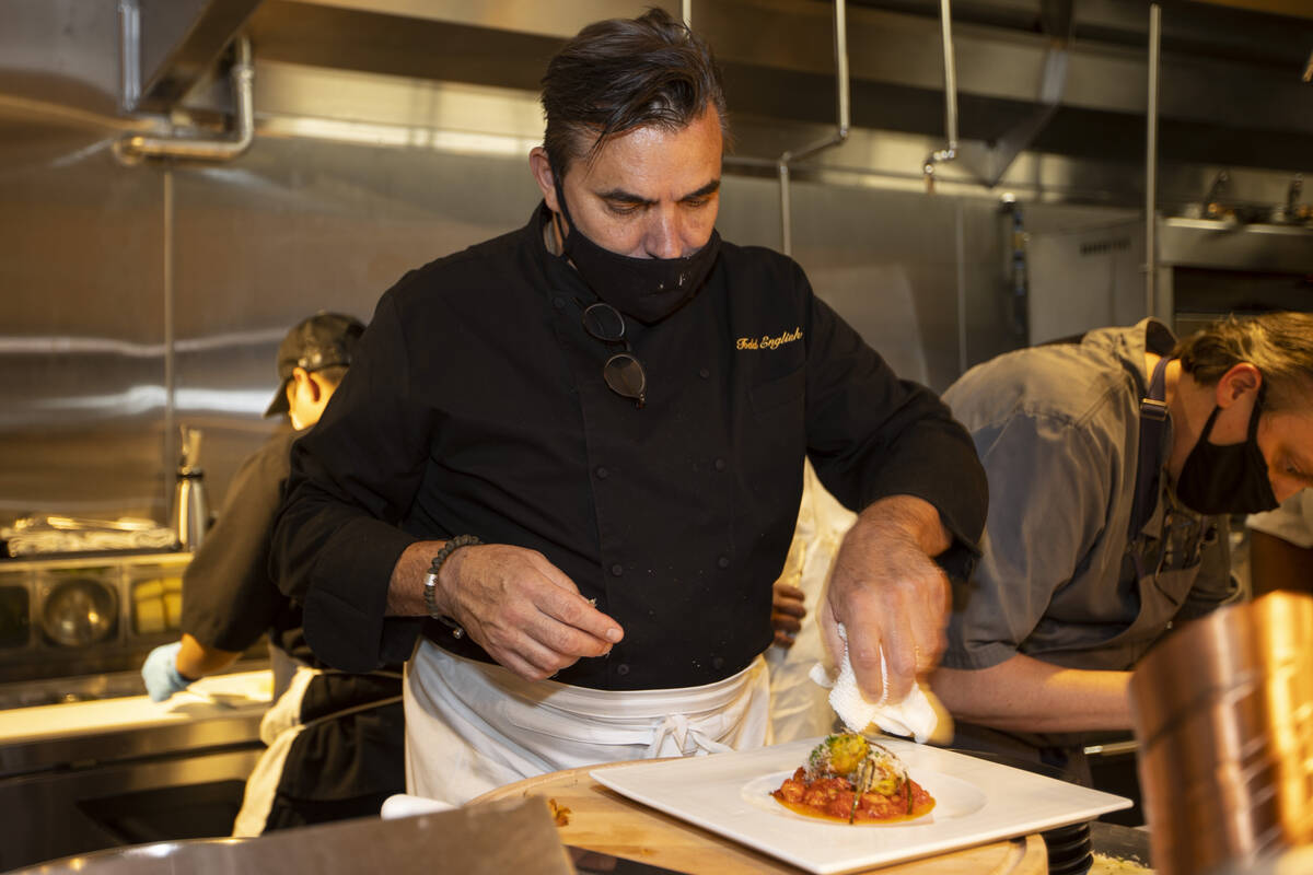 Chef and owner Todd English prepares a dish at Olives restaurant inside of Virgin Hotels Las Ve ...