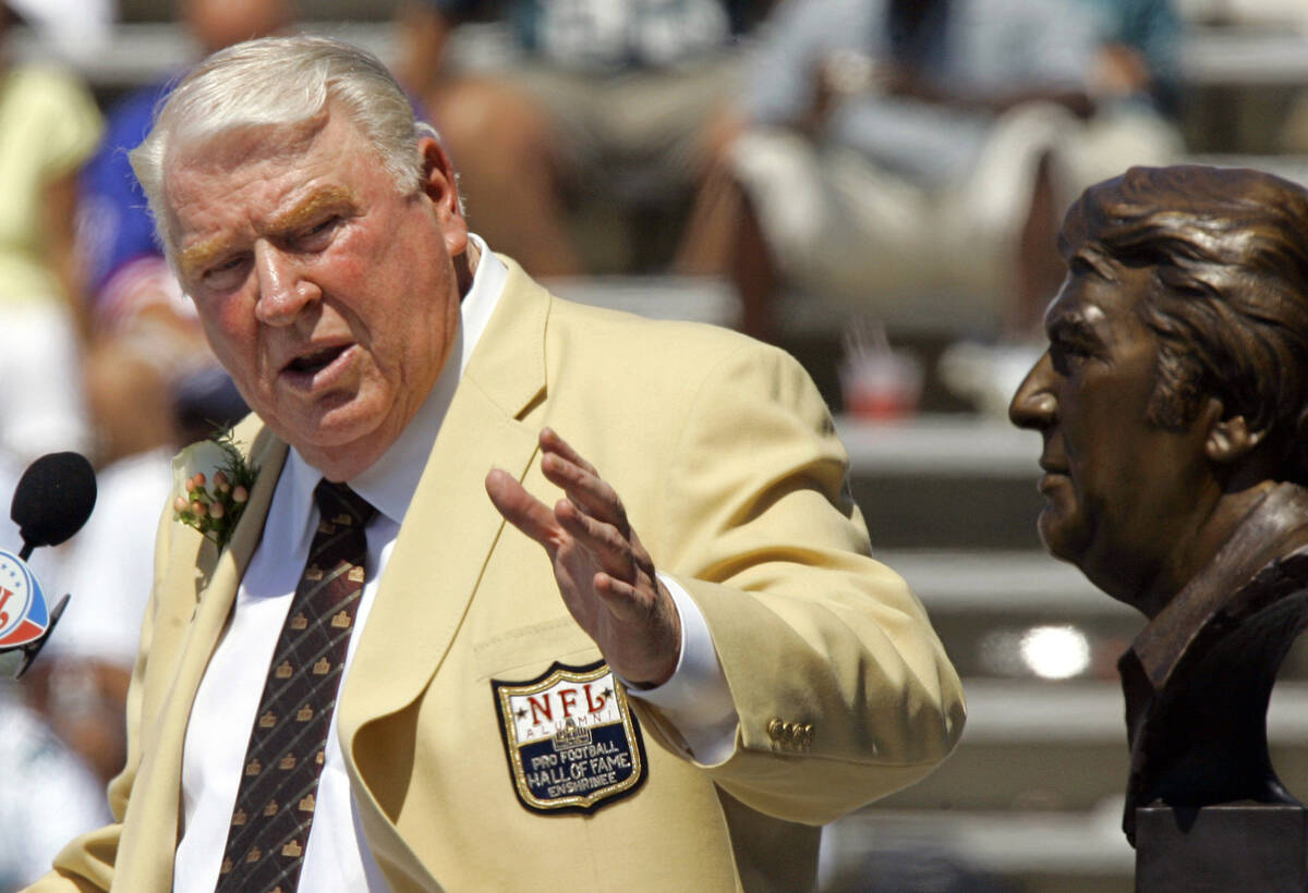 FILE - Former Oakland Raiders coach John Madden gestures toward a bust of himself during his en ...