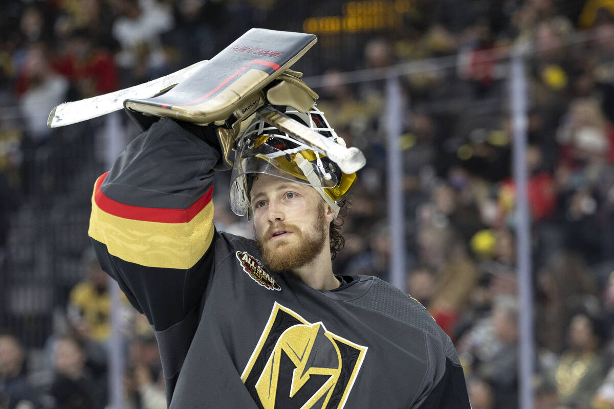 Golden Knights goaltender Laurent Brossoit (39) skates around the net during the second period ...