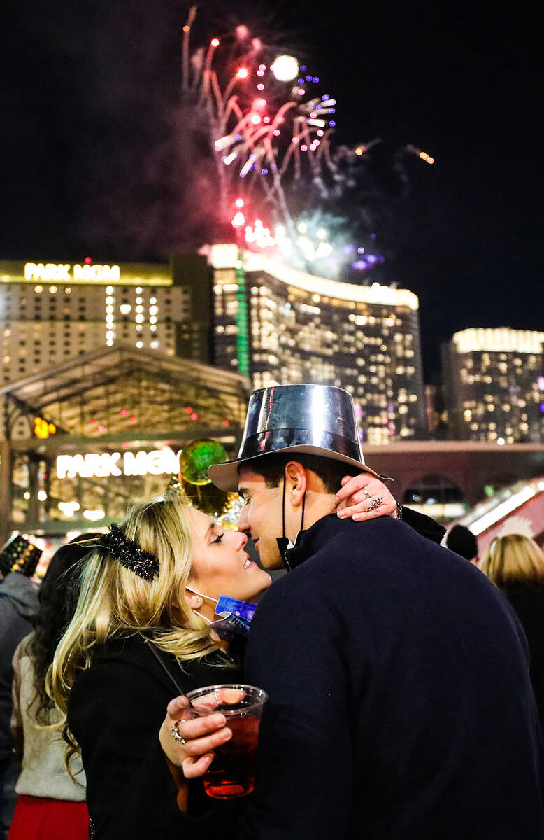Alexa Robinson kisses her boyfriend Clayton Amato, both of Henderson, on the Strip in Las Vegas ...