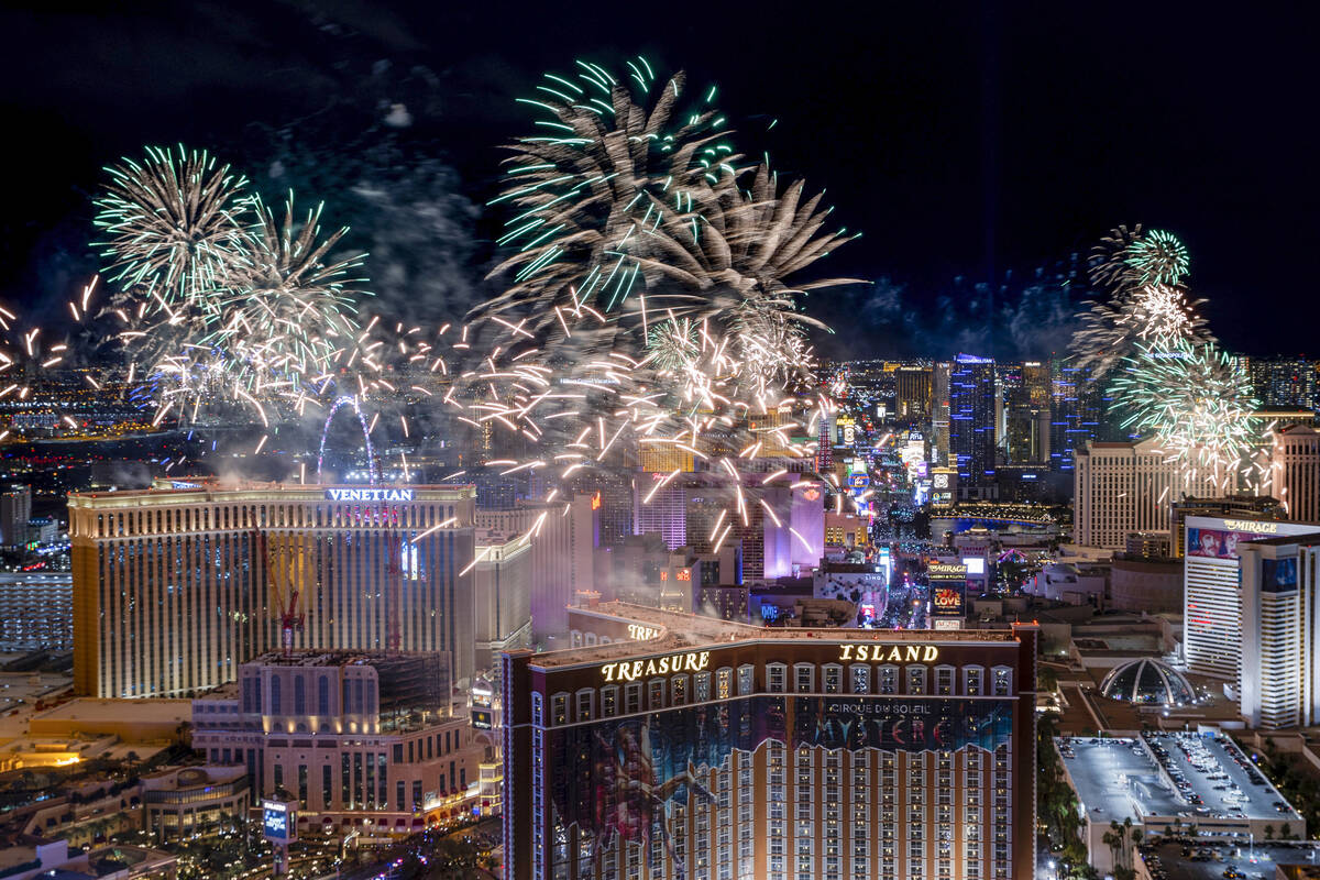 Fireworks explode over the Strip during New Year’s Eve celebrations on Saturday, Jan. 1, 2022 ...