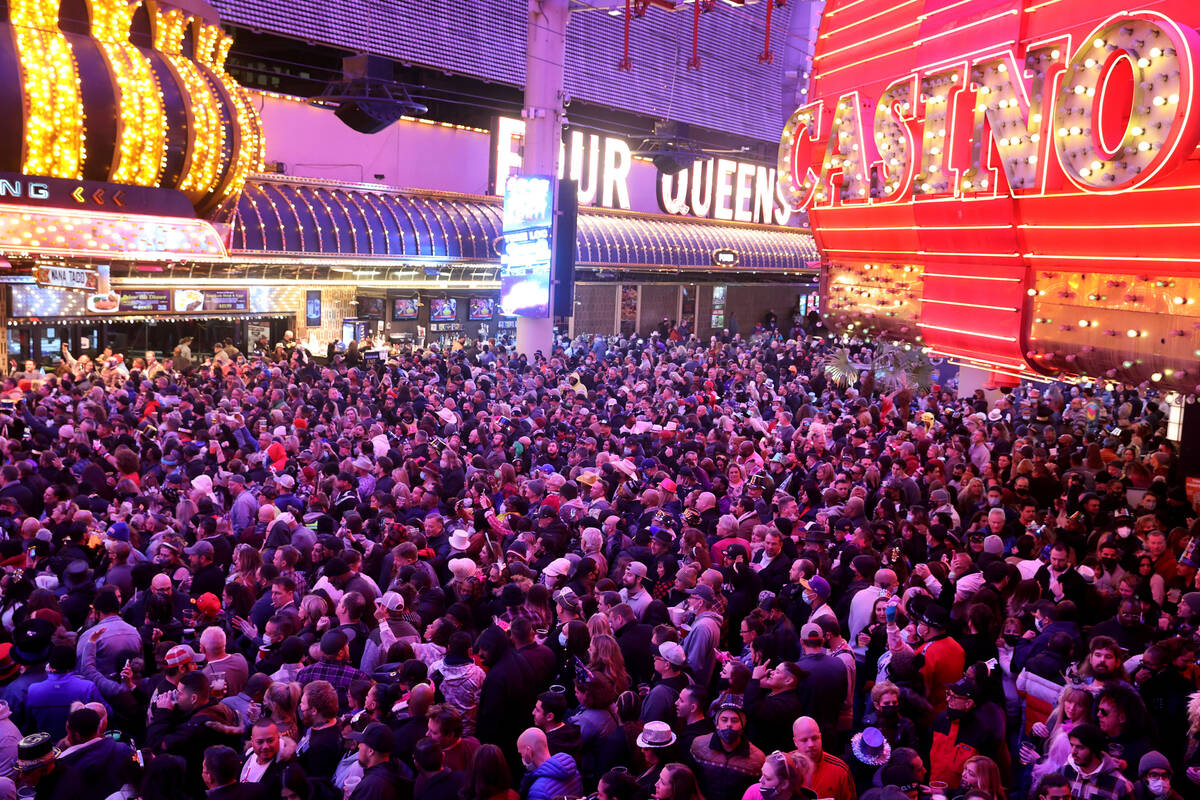 Revelers celebrate on New Year's Eve at the Fremont Street Experience in downtown Las Vegas Fri ...