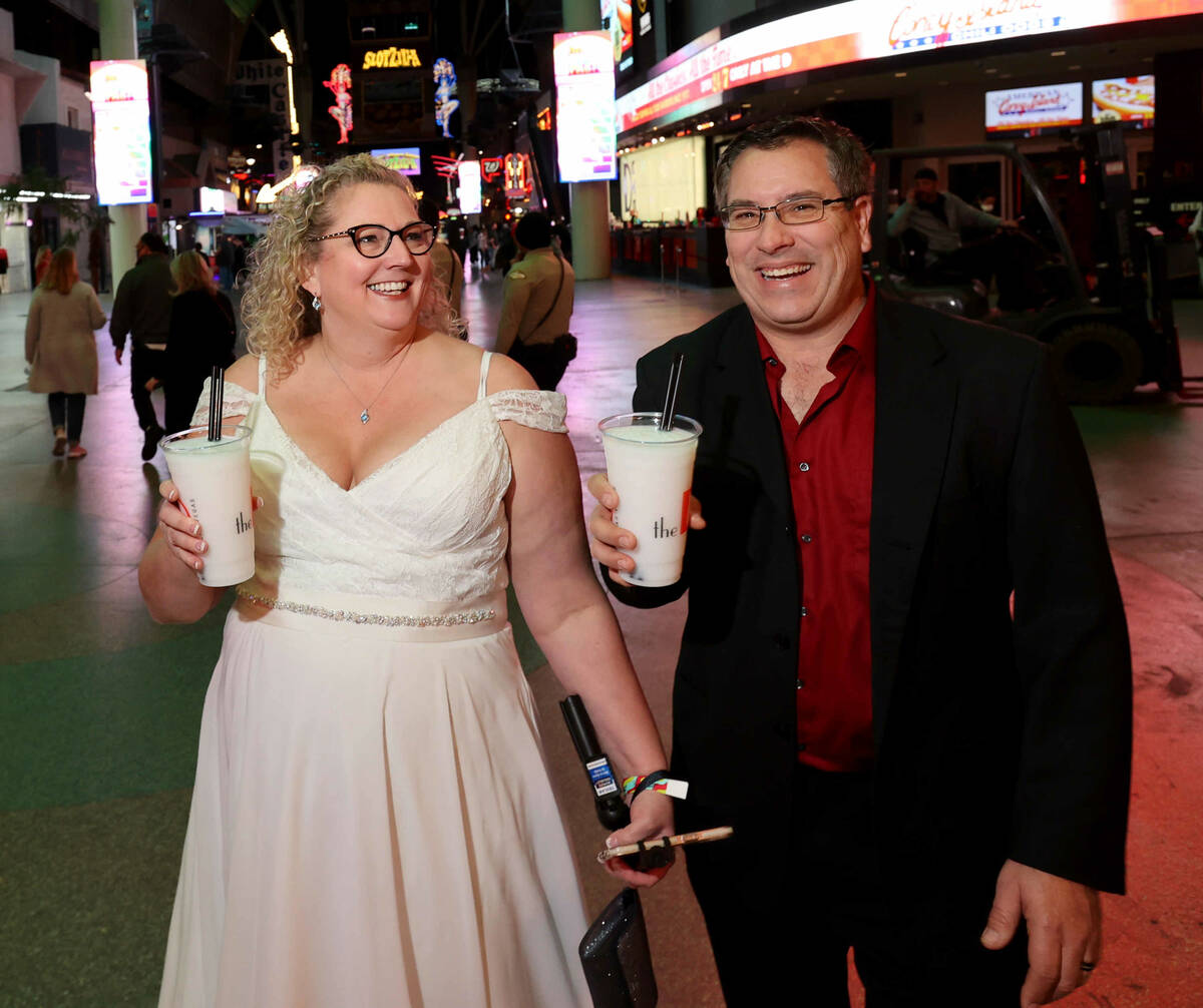 Newlyweds Stephanie and David Kereluk of Grayling, Mich. during the New YearÕs Eve party a ...