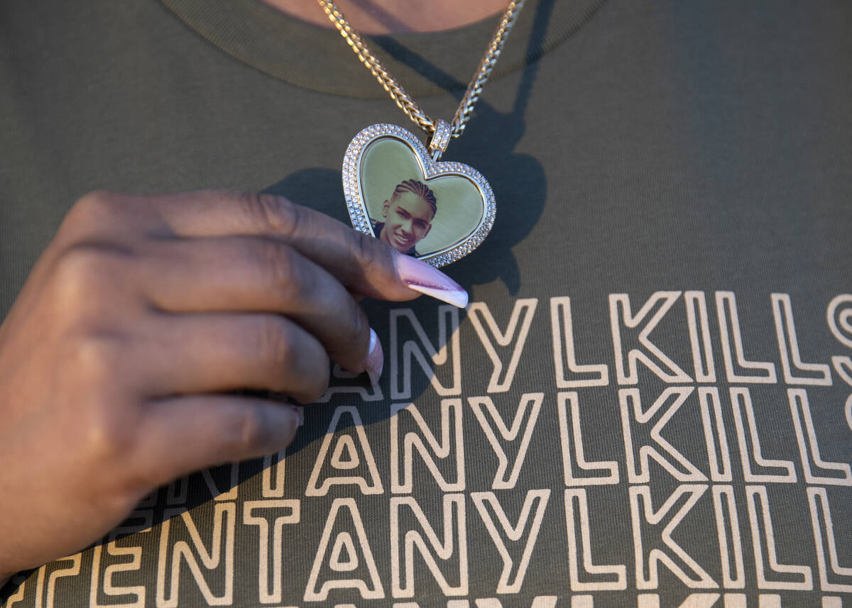 Cristina Perkins, mother of Giovanni Perkins, wears a shirt that reads #fentanylkills and a nec ...