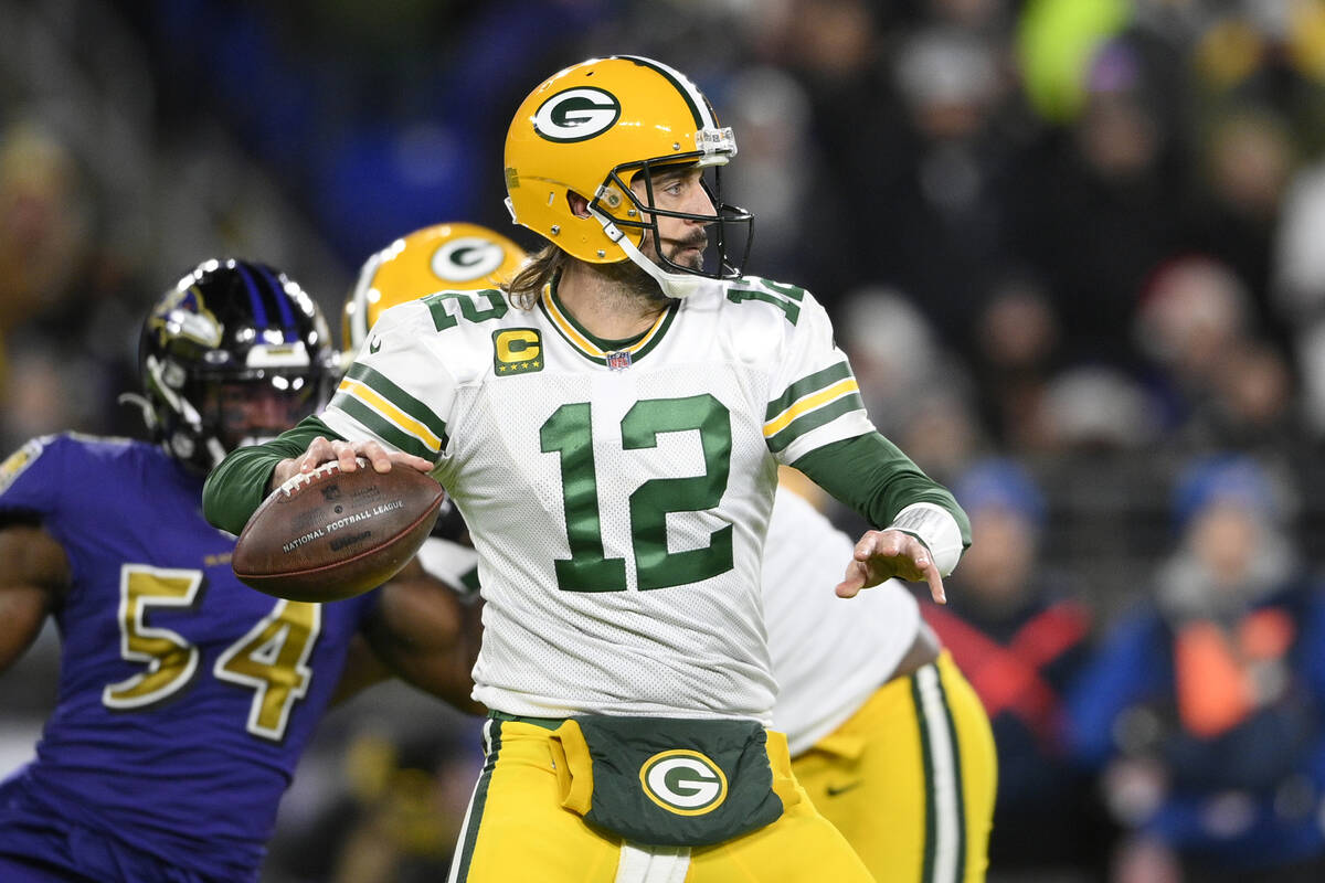 Green Bay Packers quarterback Aaron Rodgers (12) in action in the first half of an NFL football ...