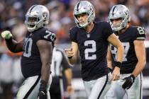 Raiders kicker Daniel Carlson (2) celebrates with teammates after making a kick in the second h ...