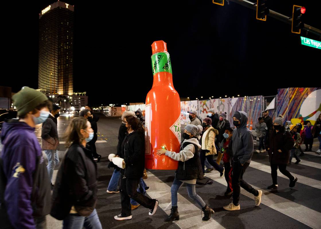 Large crowds fill the Strip on New Year’s Eve on Friday, Dec. 31, 2021, in Las Vegas.(Be ...