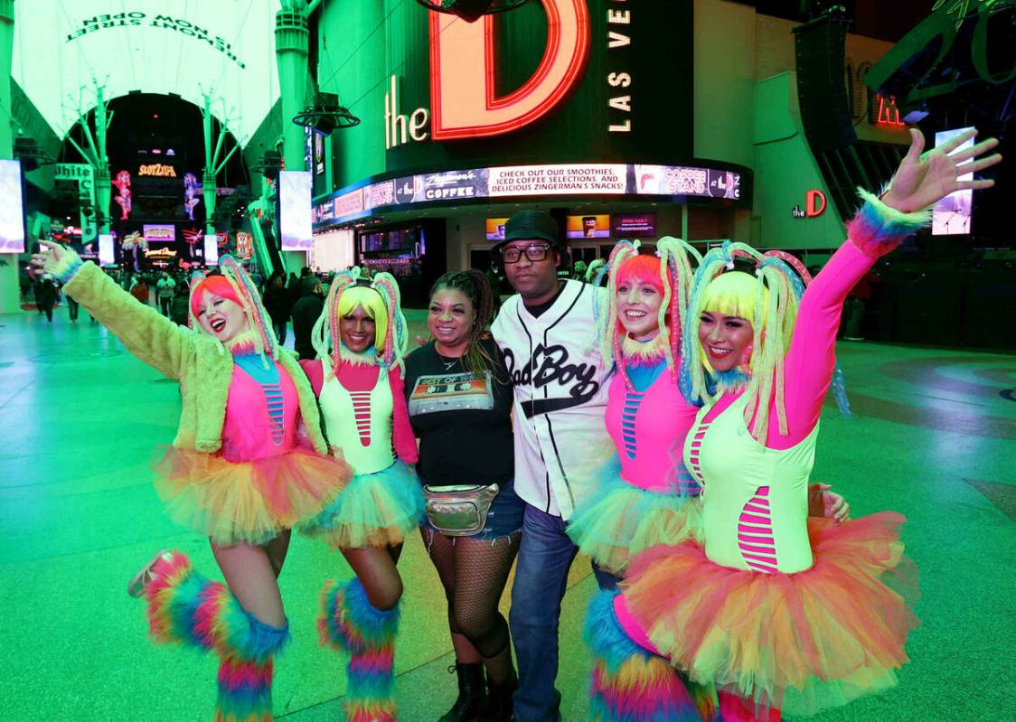 Derrick Westmoreland of Houston and Alisha McCord of Memphis, Tenn., pose with, from left, Meli ...