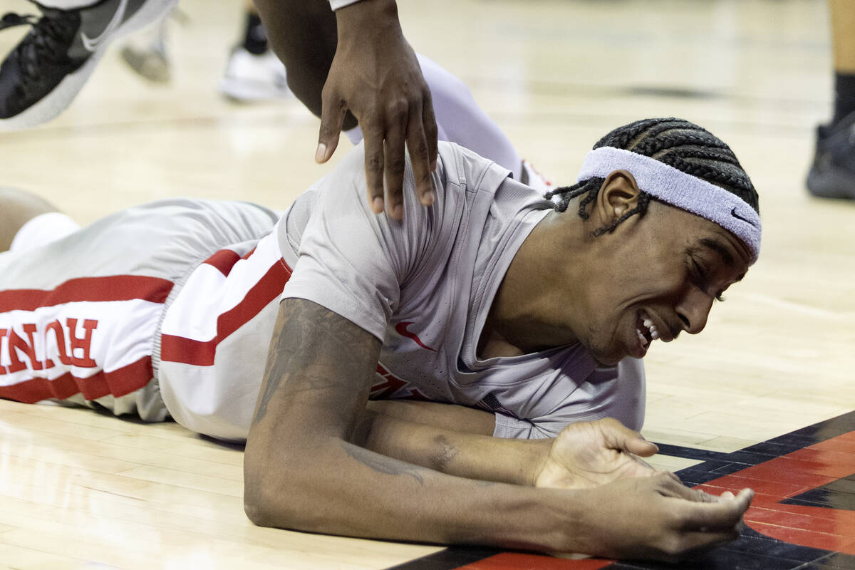 UNLV Rebels forward Donovan Williams (3) grimaces after hitting the court during the second hal ...