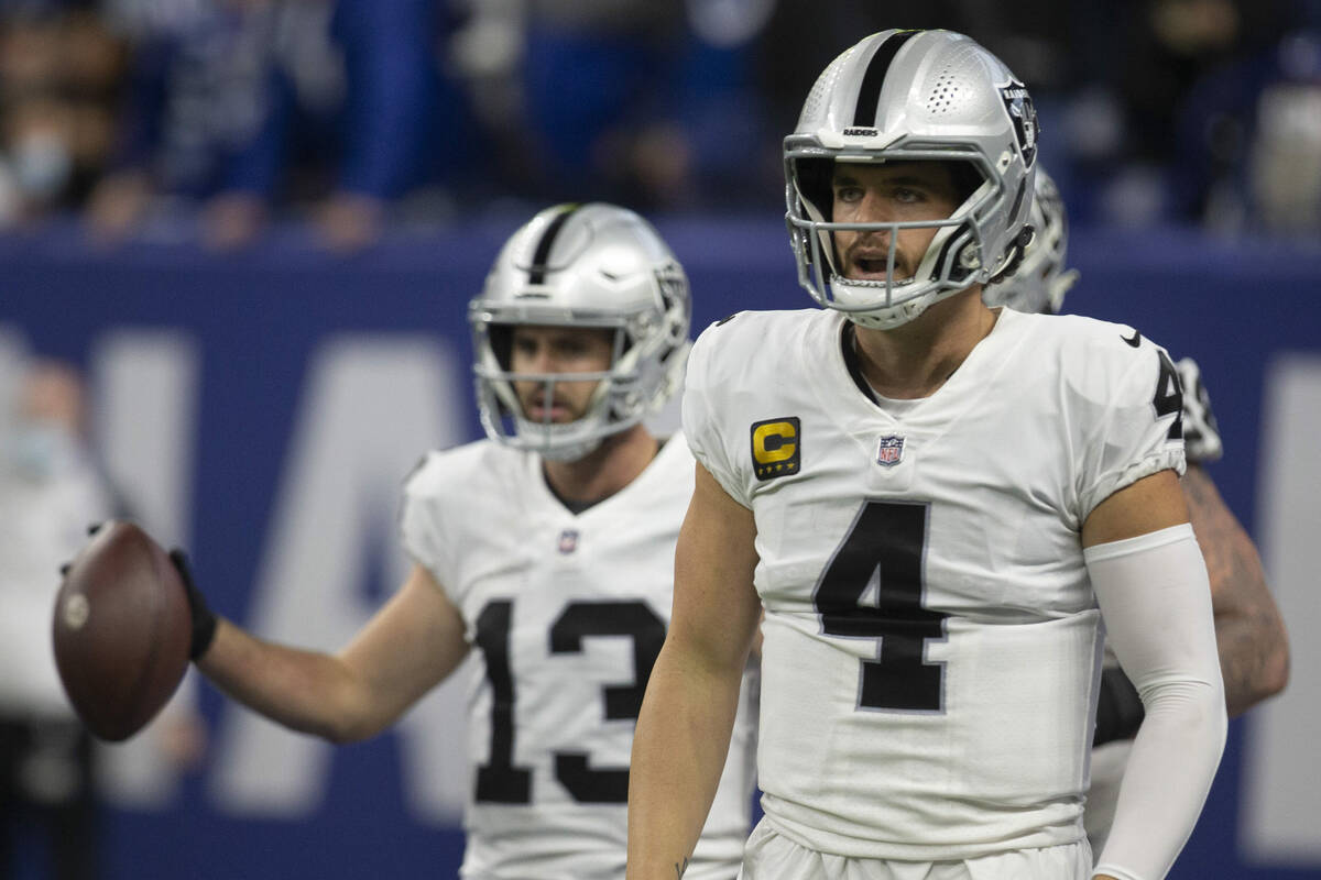 Raiders quarterback Derek Carr (4) celebrates after throwing a touchdown, a call that was later ...