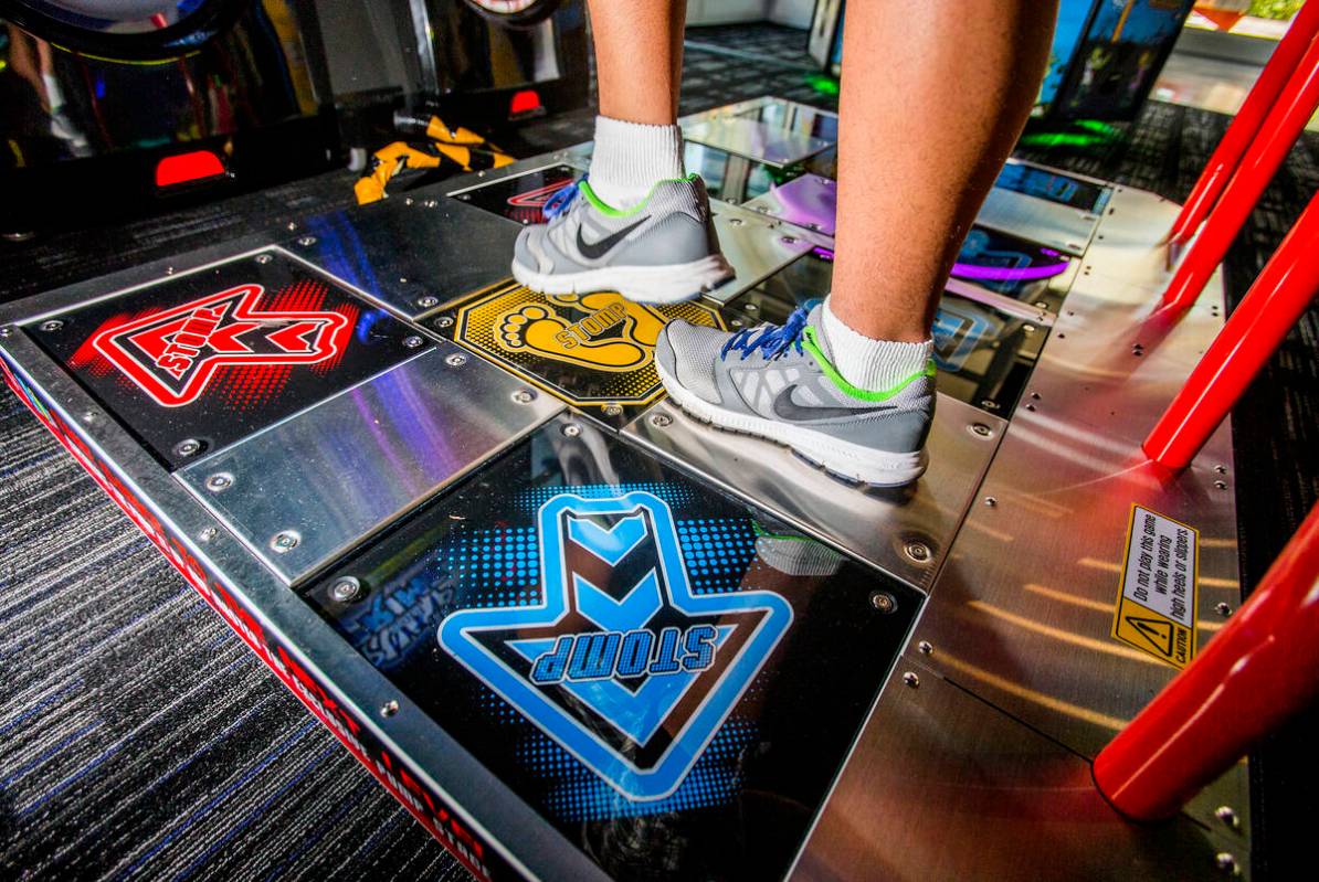 Cody Kraithong plays Punt Prime video game at Dave & Buster's in Downtown Summerlin on Monday, ...