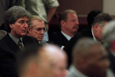 MGM-Mirage executives Richard Strum, left, and Bob Halloran sit in the front row while Mike Tys ...