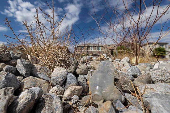 An empty water bottle in a vacant field on Saturday, Oct. 9, 2021, in Las Vegas. Dry and warm w ...