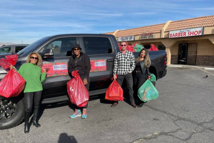 Towbin "elves" deliver toys and essentials items to help those less fortunate. (Towbin Auto Group)