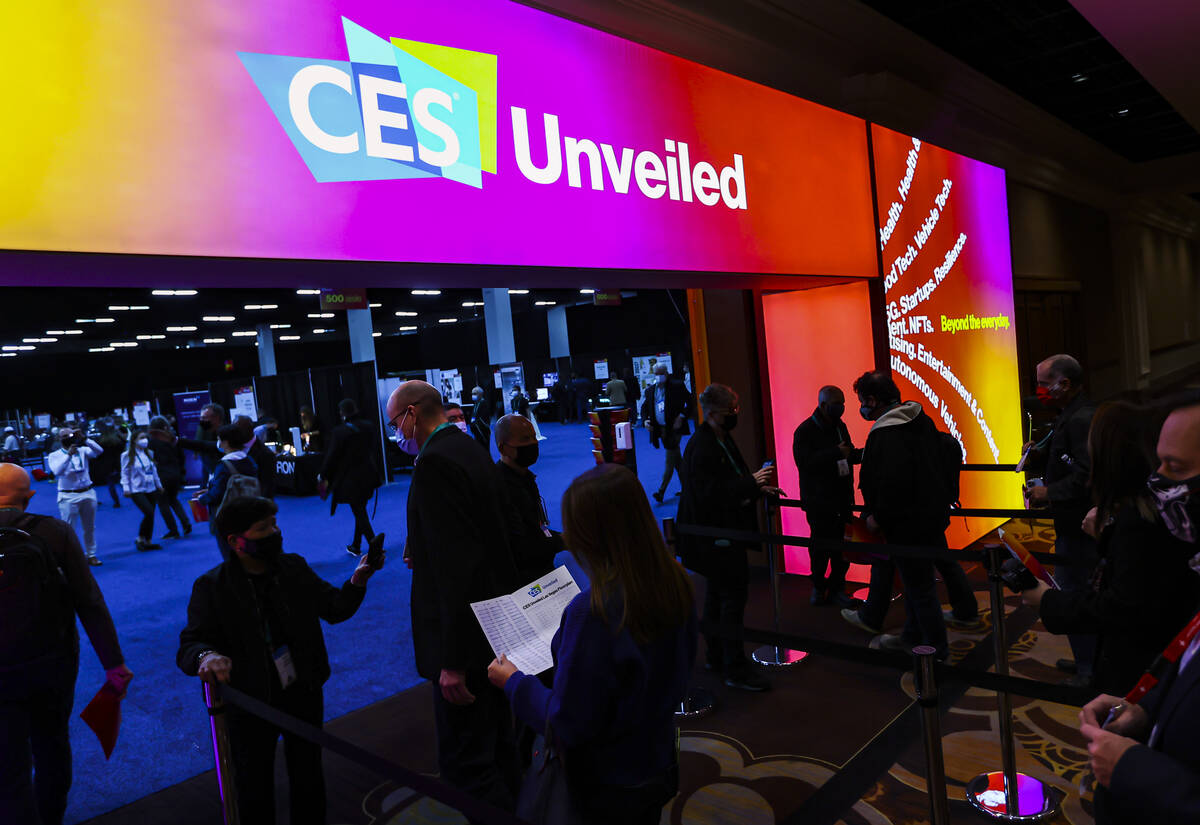 Attendees arrive for the CES Unveiled event at the Mandalay Bay Convention Center Monday, Jan. ...