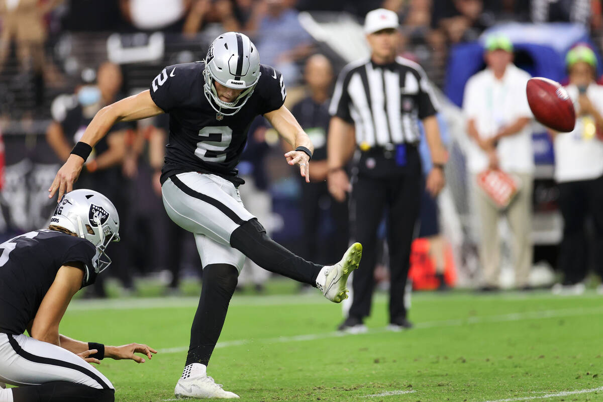 Las Vegas Raiders kicker Daniel Carlson (2) kicks a field goal for the win in overtime in a NFL ...