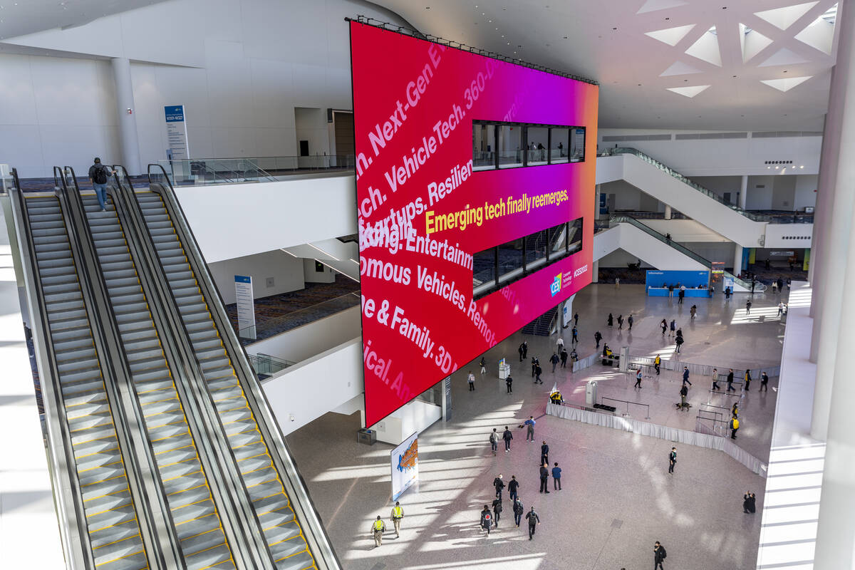 The giant electronic board inside of West Hall advertises the show during the first day of CES ...