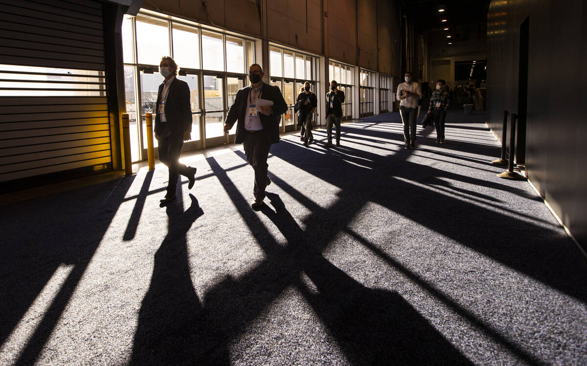 Attendees walk the show floor during CES at the Las Vegas Convention Center on Wednesday, Jan. ...