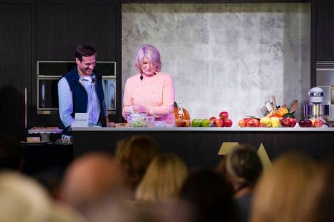 Martha Stewart and Thomas Joseph stand before an audience during Stewart's seminar at the 2021 ...