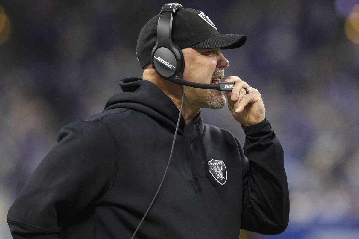 Raiders defensive coordinator Gus Bradley coaches from the sideline during the first half of an ...