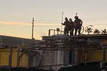 Las Vegas firefighters battled a blaze at a commercial building in east Las Vegas early Friday. ...