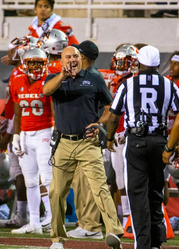 UNLV Head Coach Tony Sanchez argues with a referee versus Southern Utah during the first half ...