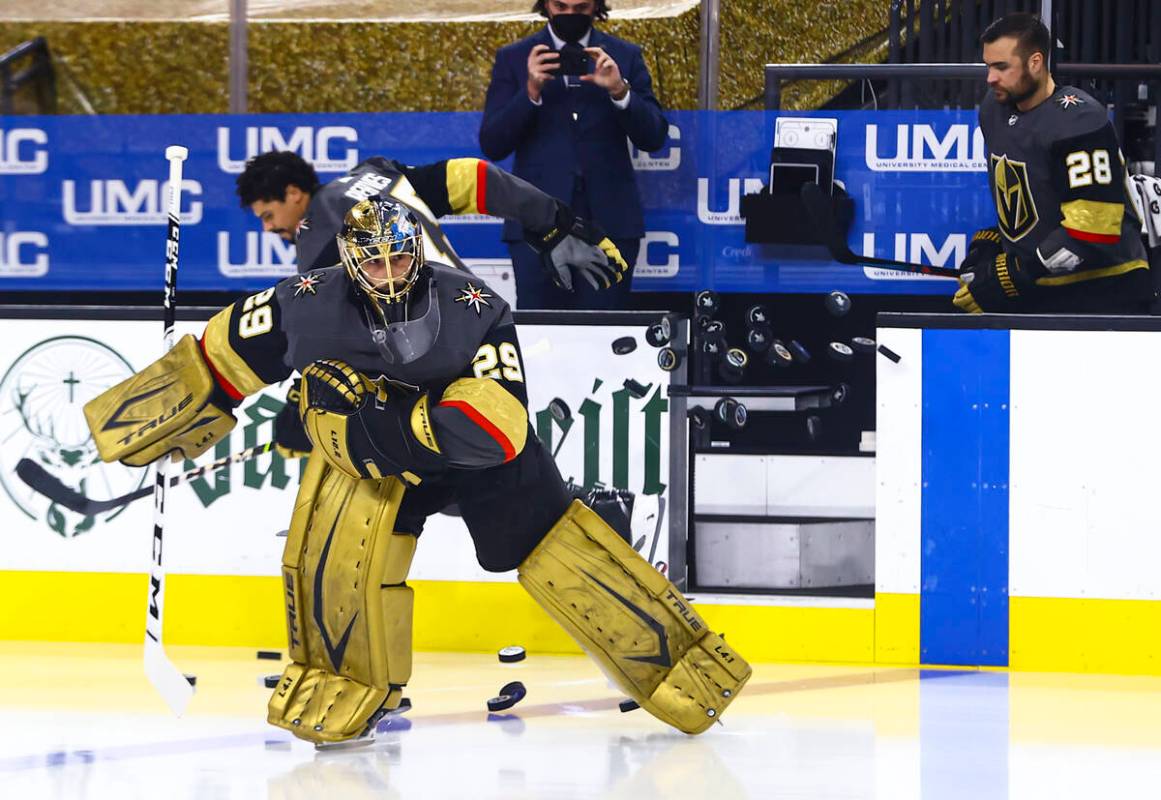 Golden Knights mgoaltender Marc-Andre Fleury warms up before Game 3 of an NHL hockey Stanley Cu ...
