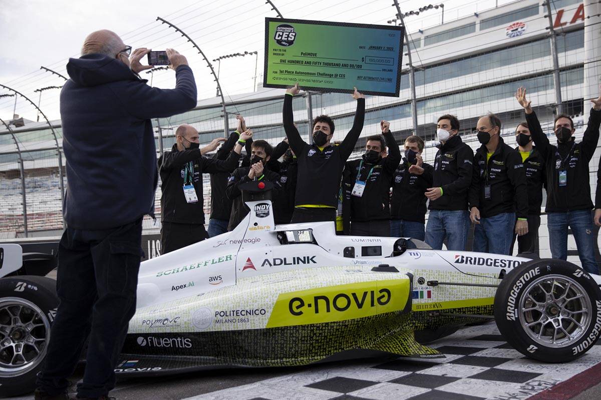 Team PoliMOVE celebrates after winning the Indy Autonomous Challenge at the Las Vegas Motor Spe ...
