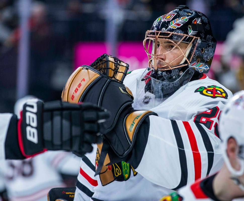 Chicago Blackhawks goaltender Marc-Andre Fleury (29) greets a teammate during warm ups before t ...