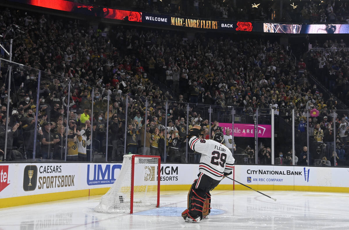 Chicago Blackhawks goaltender Marc-Andre Fleury acknowledges the crowd during a presentation be ...