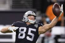 Raiders tight end Derek Carrier (85) warms up before the start of an NFL football game against ...