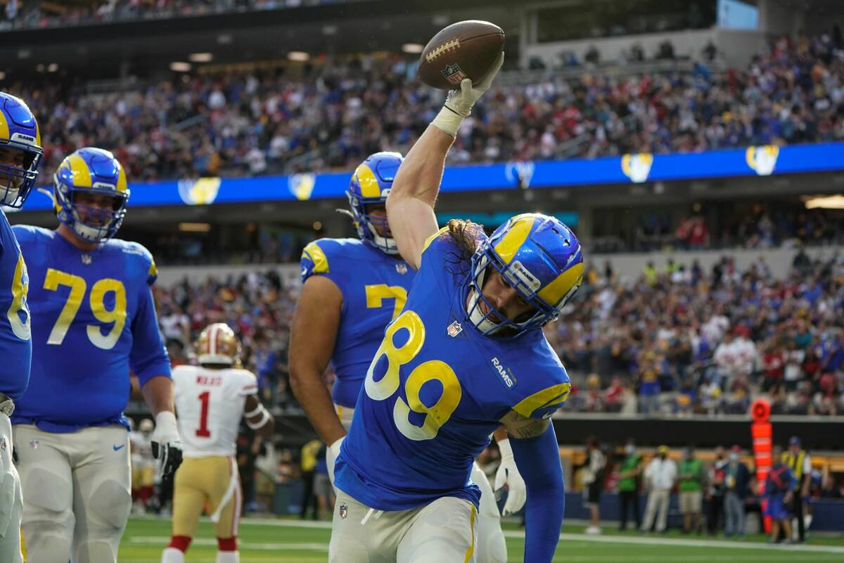Los Angeles Rams tight end Tyler Higbee (89) reacts after catching a pass for a touchdown durin ...