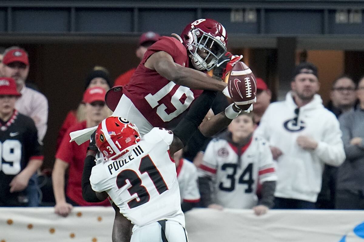 Georgia's William Poole breaks up a pass intended for Alabama's Jahleel Billingsley during the ...