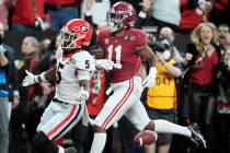 Georgia's Kelee Ringo returns an interception for a touchdown during the second half of the Col ...