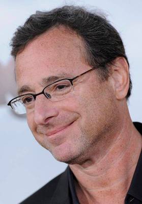 Bob Saget arrives at the premiere of the seventh season of the HBO series "Entourage" in Los An ...