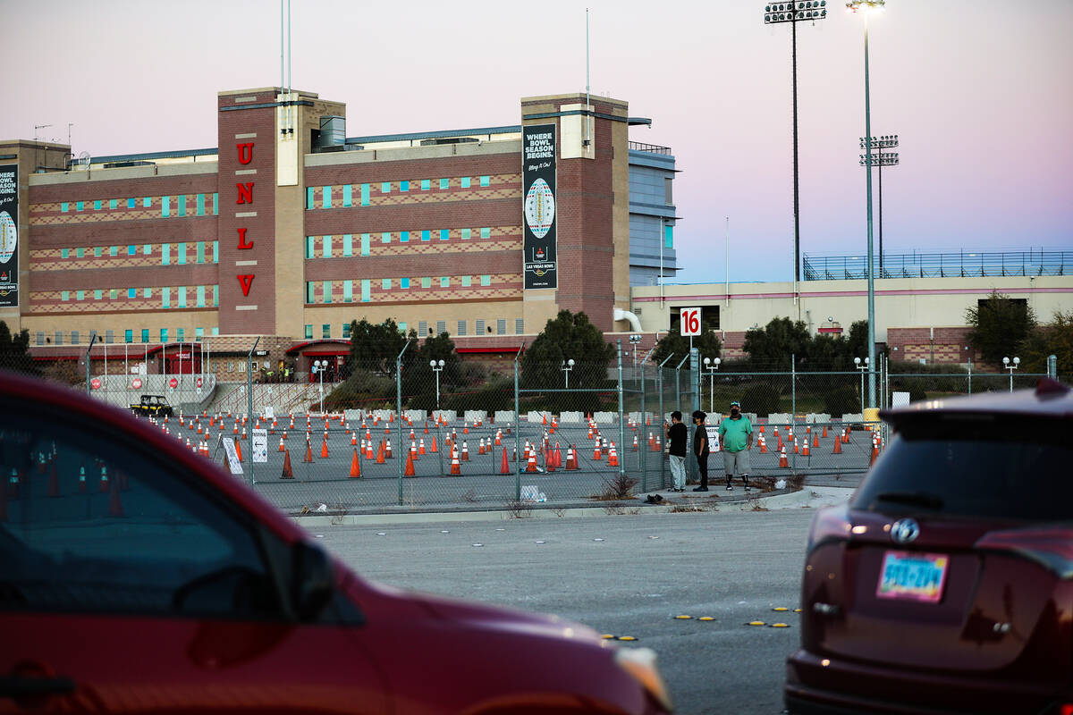 People for the COVID-19 testing and vaccine clinic to open at Sam Boyd Stadium on Sunday, Jan. ...