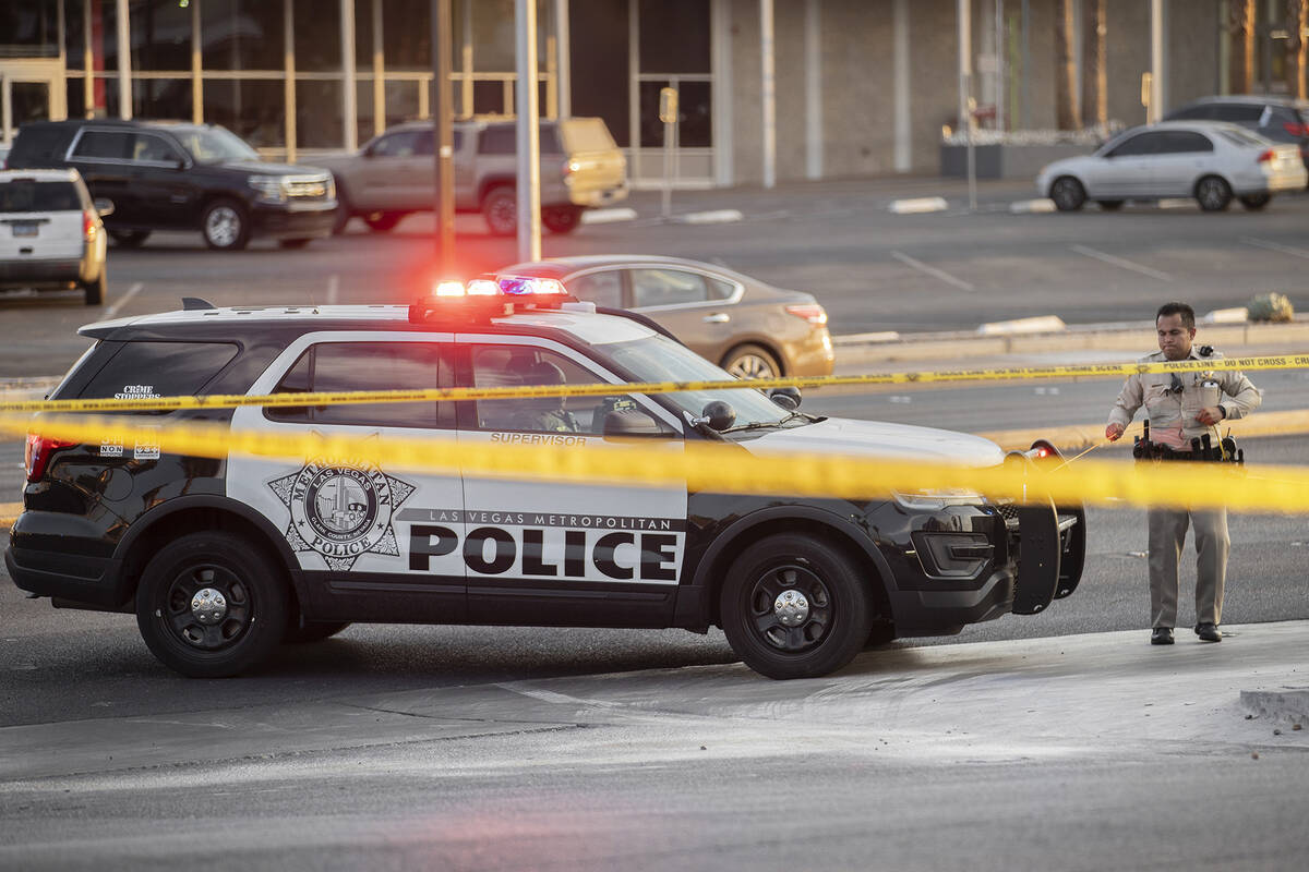 Las Vegas Metropolitan Police investigate a homicide at East Charleston Boulevard and South Mar ...