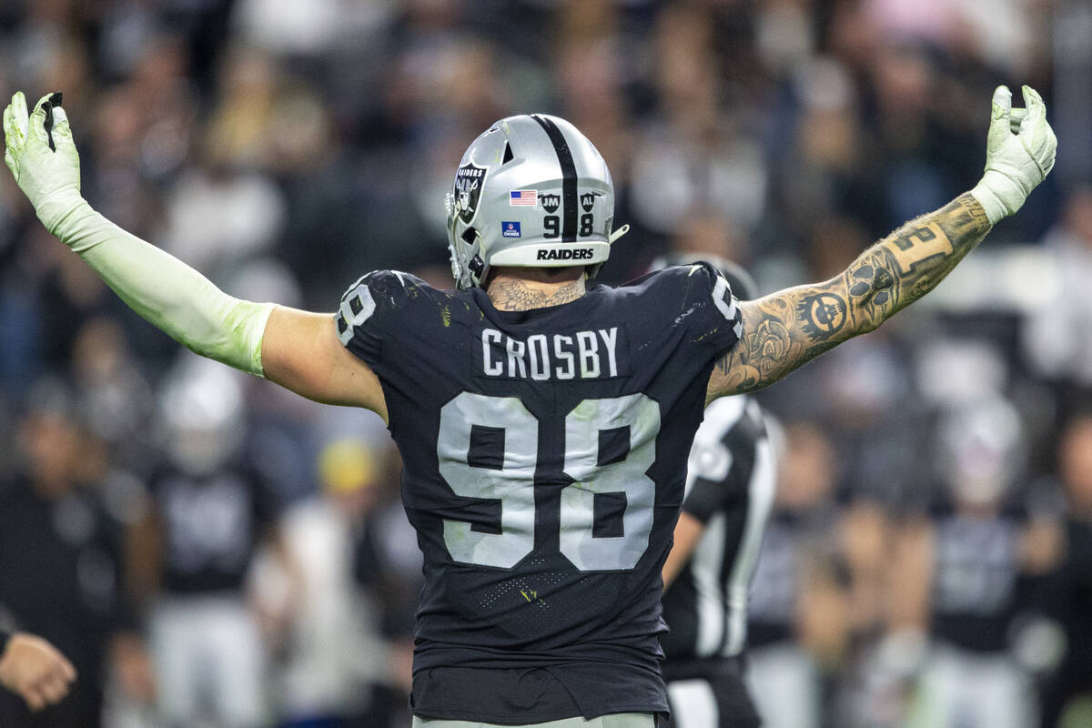 Raiders defensive end Maxx Crosby (98) poses during the second half of an NFL football game aga ...
