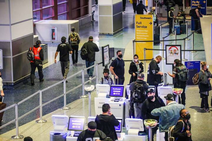 Guests in the ticketing area of Harry Reid International Airport on Monday, Jan. 10, 2022 in La ...