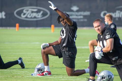 Raiders linebacker Nicholas Morrow (50) stretches during the teamÕs NFL training camp prac ...