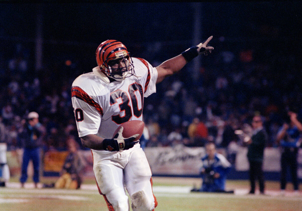 Running back Ickey Woods (30) of the Cincinnati Bengals finishes off his "Ickey Shuffle&qu ...