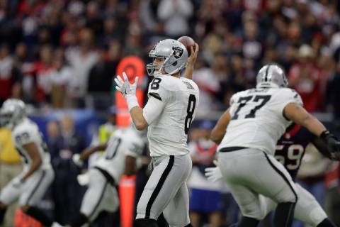 Oakland Raiders quarterback Connor Cook (8) works against the Houston Texans during the first h ...