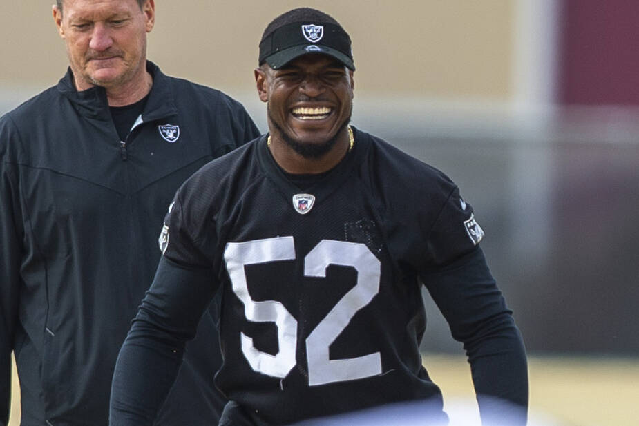 Raiders middle linebacker Denzel Perryman (52) laughs during practice at Raiders headquarters a ...