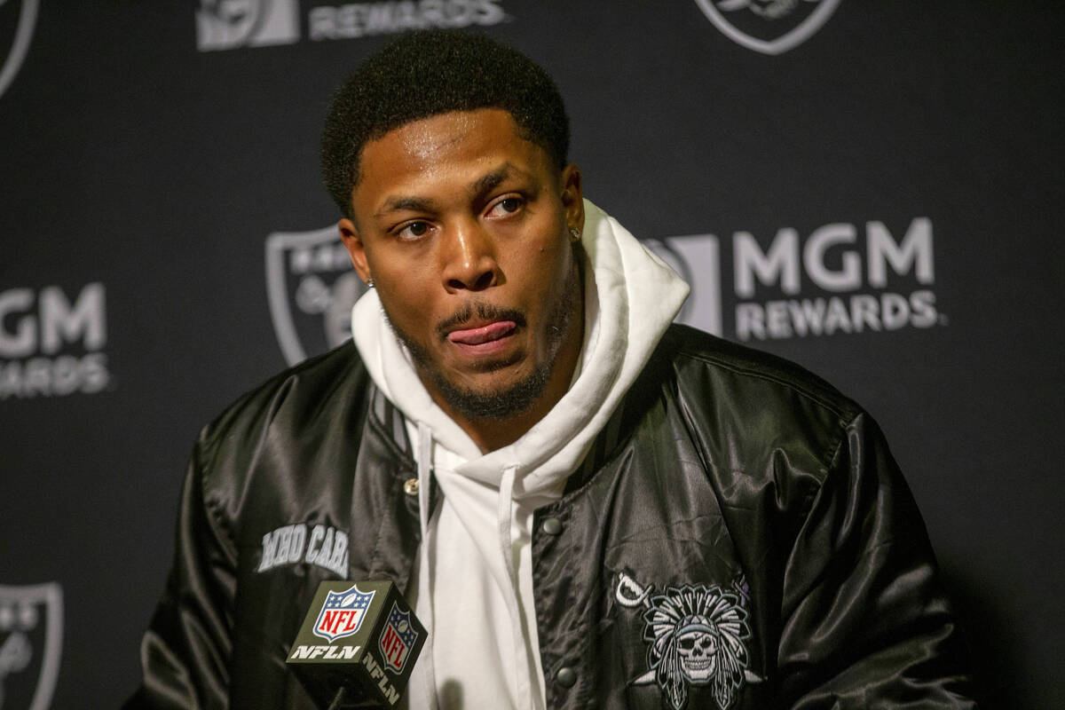 Raiders running back Josh Jacobs attends the postgame news conference after losing an NFL playo ...
