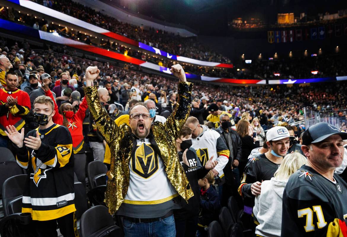 Golden Knights fans in the first period during an NHL hockey game against the Pittsburgh Pengui ...