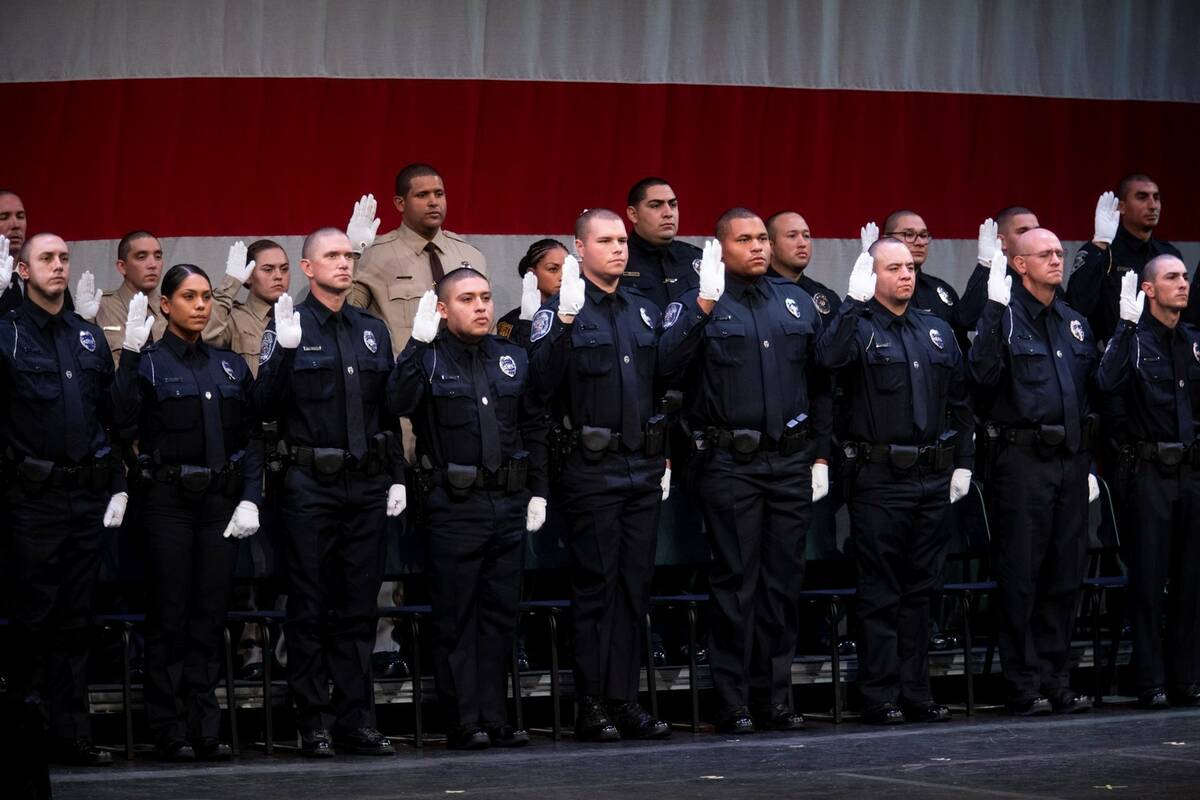 Academy graduates are sworn in during the Southern Desert Regional Police Academy class of 2022 ...