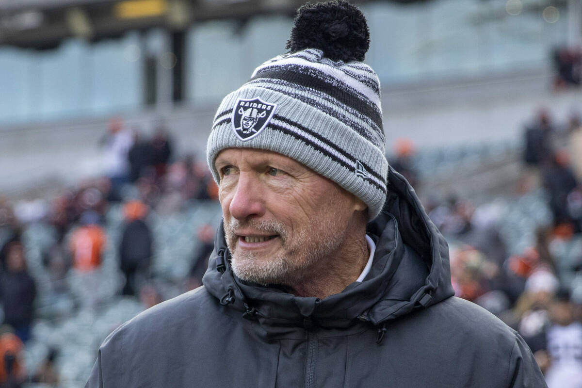 Raiders general manager Mike Mayock on the field before of an NFL playoff game between the Rai ...